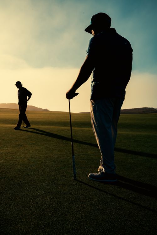 Golfers at Hanazono Niseko with Mt. Yotei backdrop